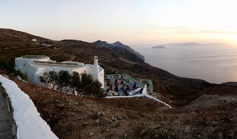 view of 'Manalis Winery' in the background of blue sky and the sea